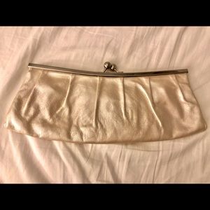 Hobo clutch with shoulder strap.